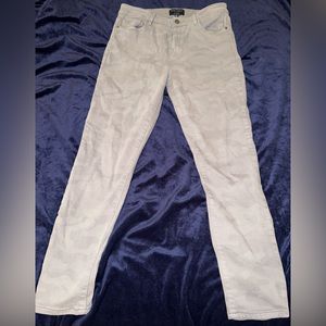 Light washed camo skinny jeans